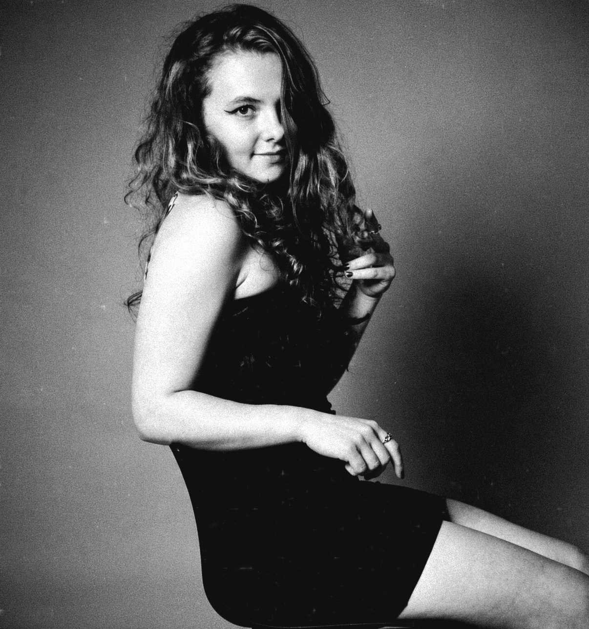 Black-and-white editorial portrait of Ellie Harris