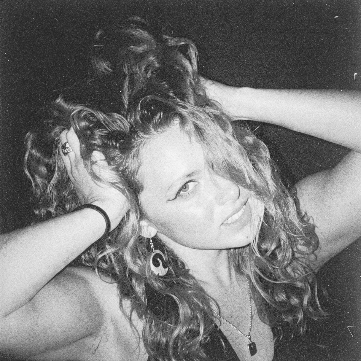 Black-and-white close-up portrait of Ellie Harris